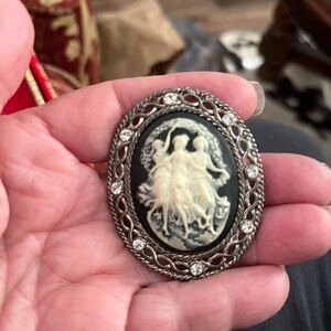 Elegant Black and Silver Cameo Brooch